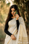 Ivory & Gold Onam Striped Mul Cotton Saree with Tassels